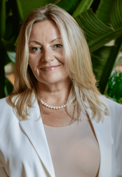 Kobieta w biznesowym ubraniu, Trenerka Heuresis